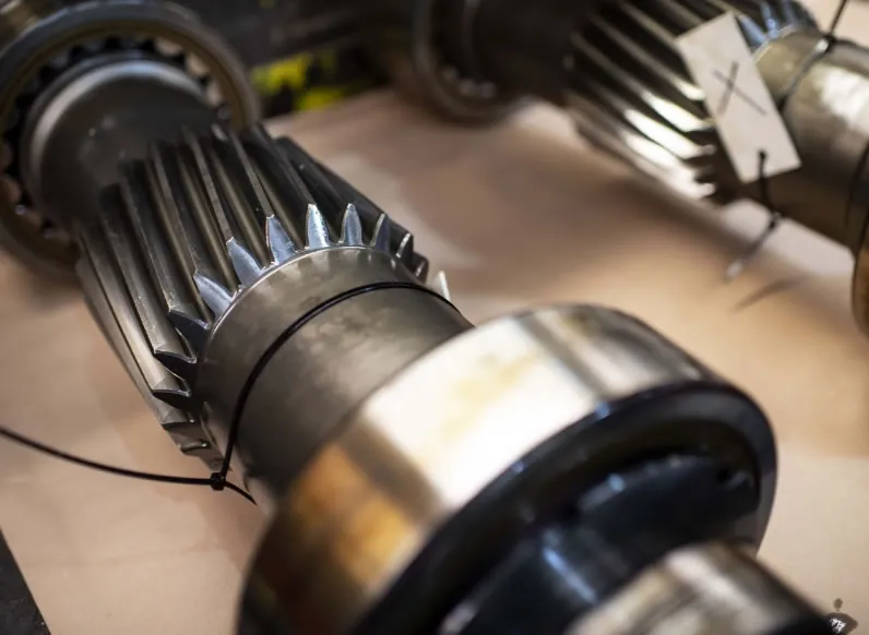 Metallic cylindrical drilling equipment gear assembly with precision-machined components, supporting API spare parts maintenance for Exuocova services worldwide.